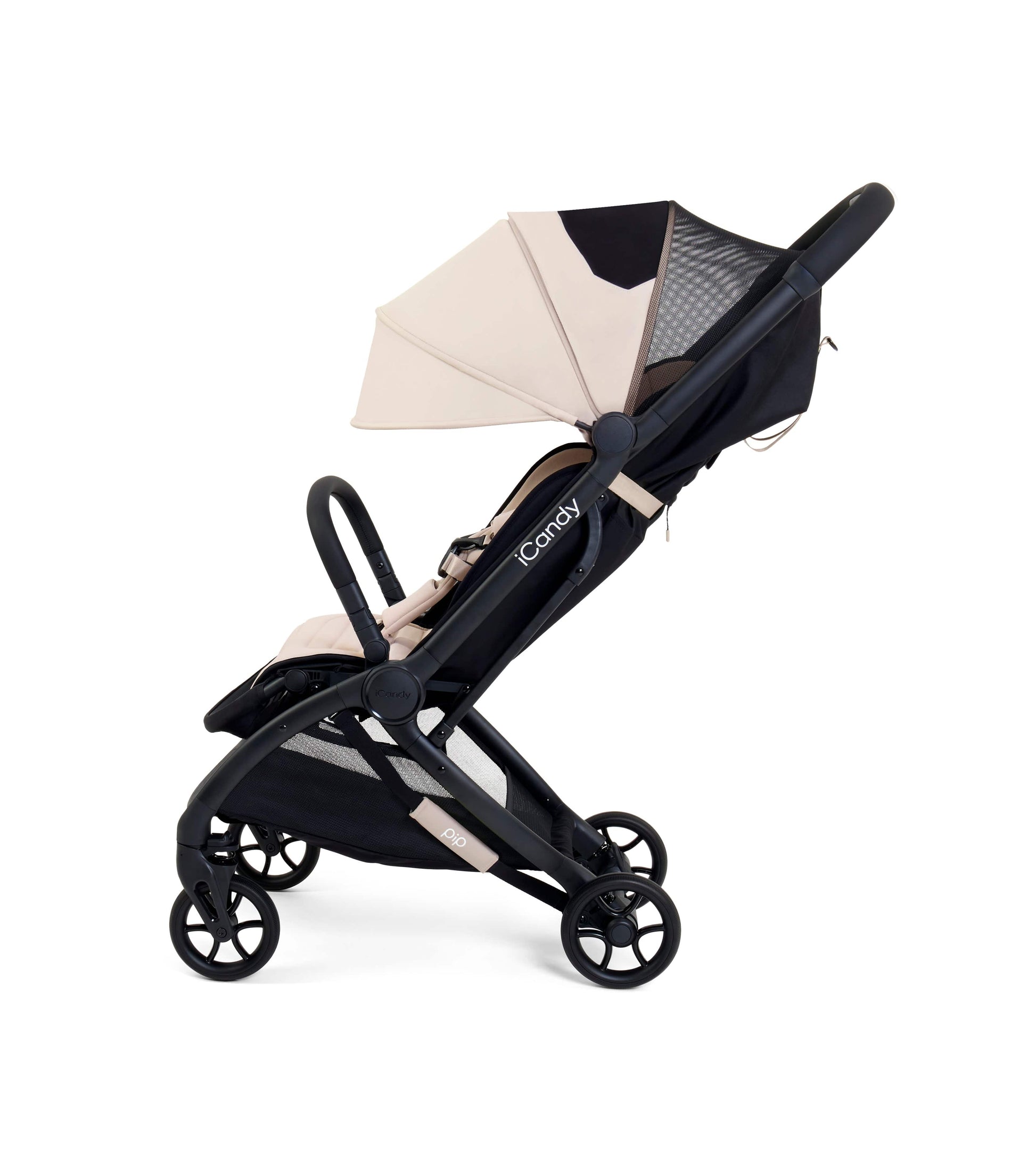 Black and beige stroller with canopy on a white background