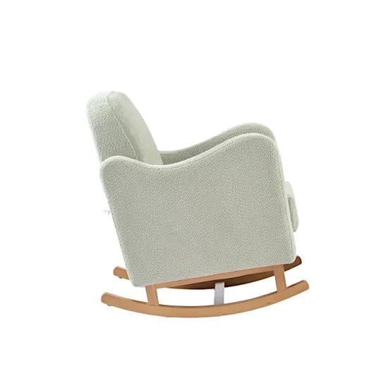 Bebe & Beyond Soother Nursing Chair in Sage Boucle side view showing curved silhouette and solid wood rocking base