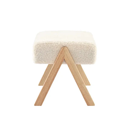 Bebe & Beyond Storyteller Nursing Stool rear view showing A-frame natural wood leg structure and off-white Teddy upholstery
