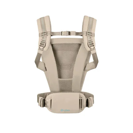 Cybex Amya Baby Carrier in Natural Beige, rear view showing padded back panel, adjustable chest clip, and hip belt