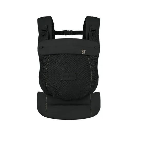 Cybex Amya Baby Carrier in Black with gold contrast stitching, front view - AMYA branding visible on chest flap