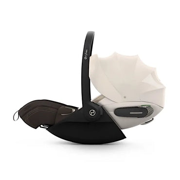 Side view of the CYBEX Cloud S infant car seat with the XXL sun canopy extended and the carry handle upright