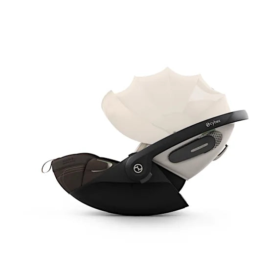 Side view of the CYBEX Cloud S baby car seat with the carry handle lowered and the sun canopy extended