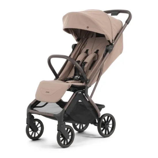 Oyster F-Lite Compact Stroller in Taupe with large wheels, bronze frame and brown leatherette handle