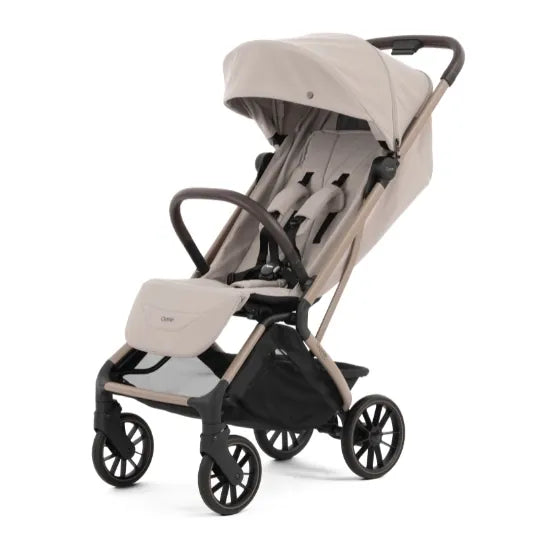 Oyster F-Lite Compact Stroller in Putty with large wheels, champagne frame and brown leatherette handle