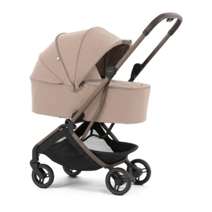 Oyster F-Lite in Taupe in carrycot mode with the UPF50+ carrycot canopy fully extended