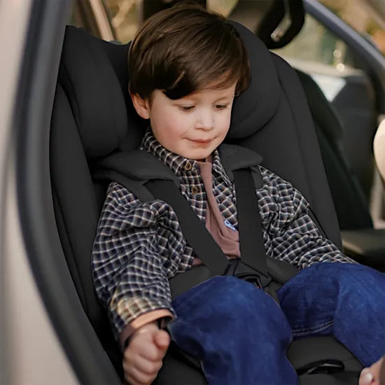 Toddler secured in the Silver Cross Motion 3 car seat with the EasyFit 5-point sprung harness