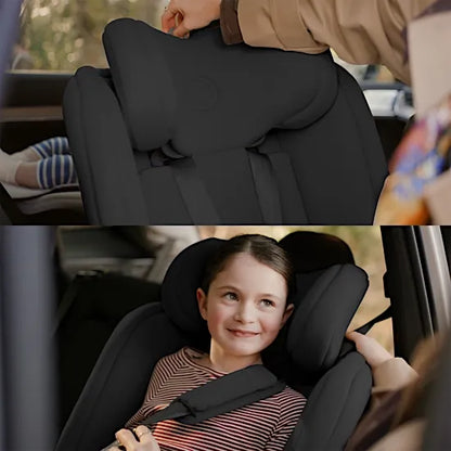 Adjusting the Silver Cross Motion 3 one-hand headrest, with a child seated in high-back booster mode using the seat belt pad